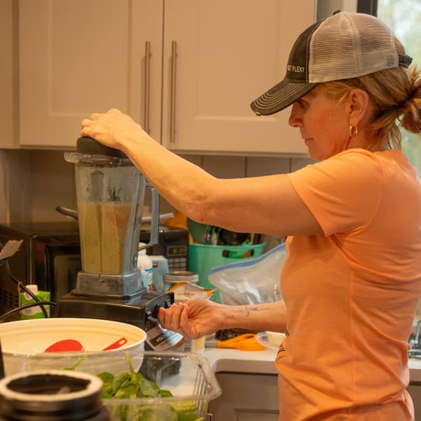 Nutritionist preparing a meal with fresh ingredients